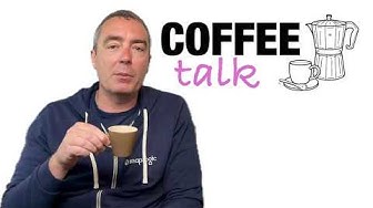 Me holding a coffee cup