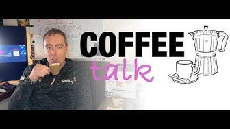 Me holding a coffee cup