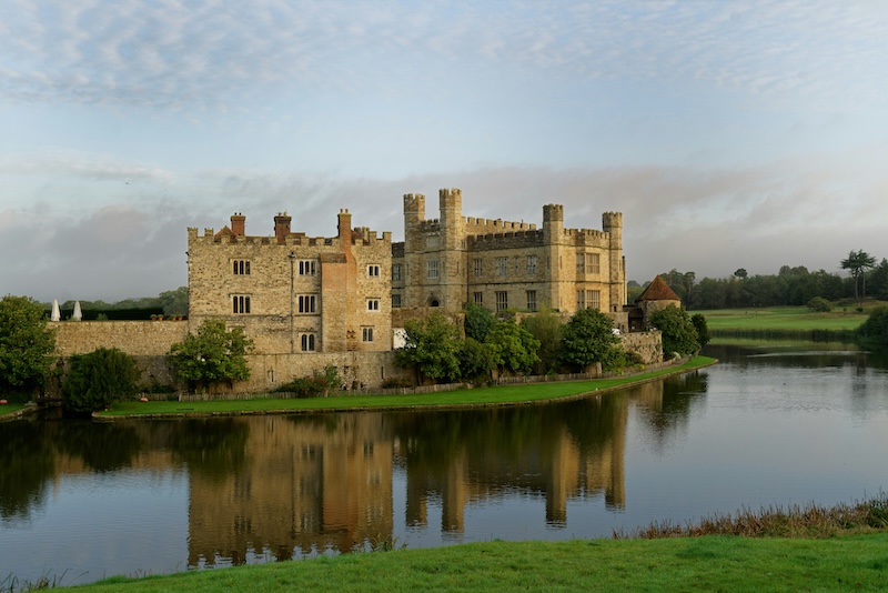 A stately home surrounded by a moat