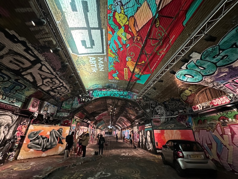 Railway arches covered in graffiti