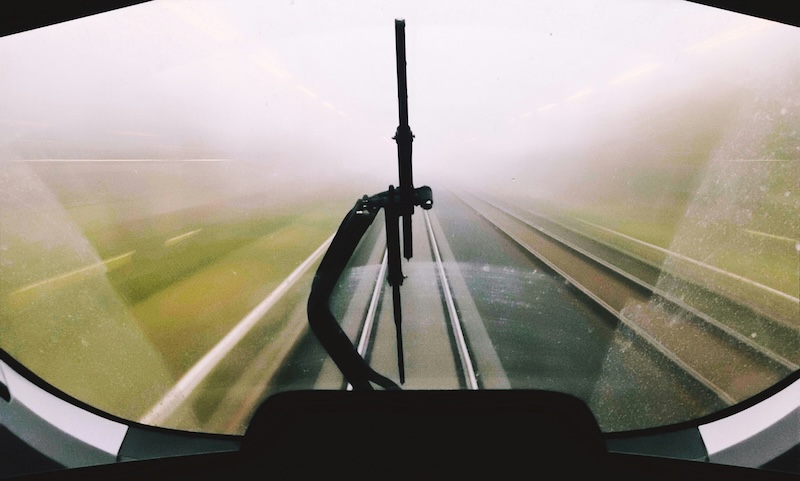 A train speeding along the rails